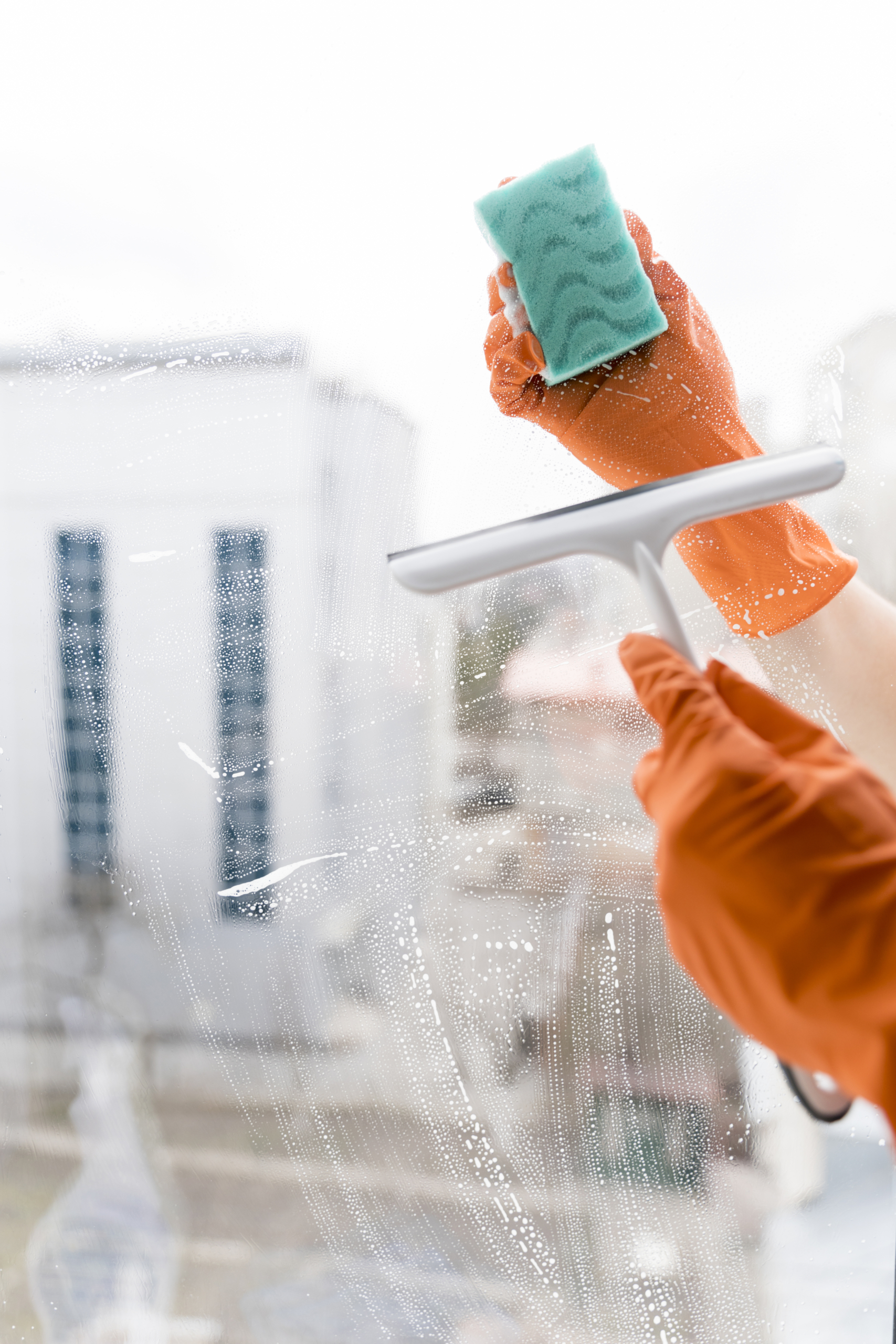 man-cleaning-windows man-cleaning-windows